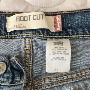 Distressed Levi’s 515 Bootcut Jeans